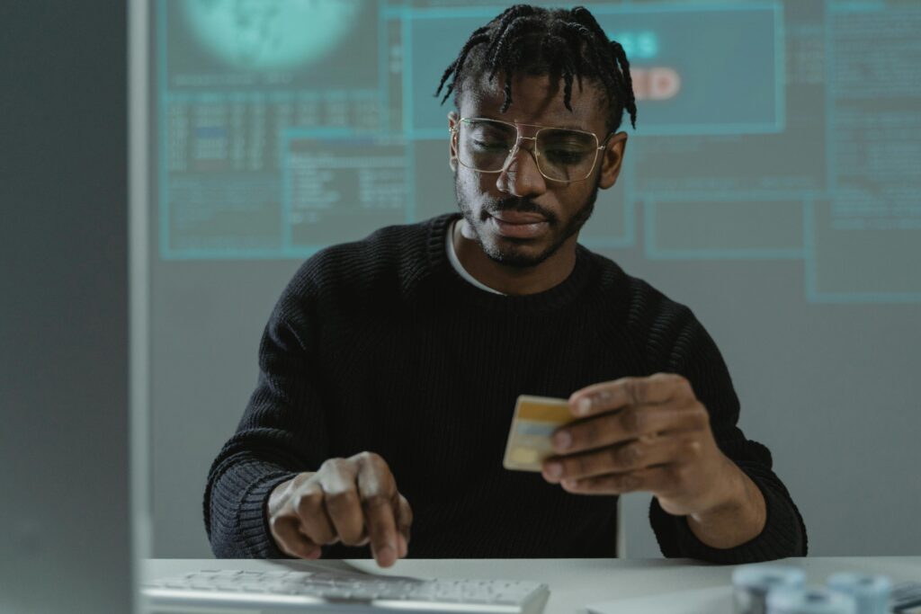Man fills out credit card information online